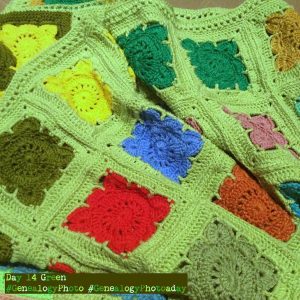 Green edged crocheted granny squares